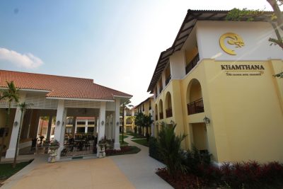 The entrance and the hotel sign