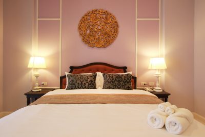 A Deluxe Room and its carved gilt medallion